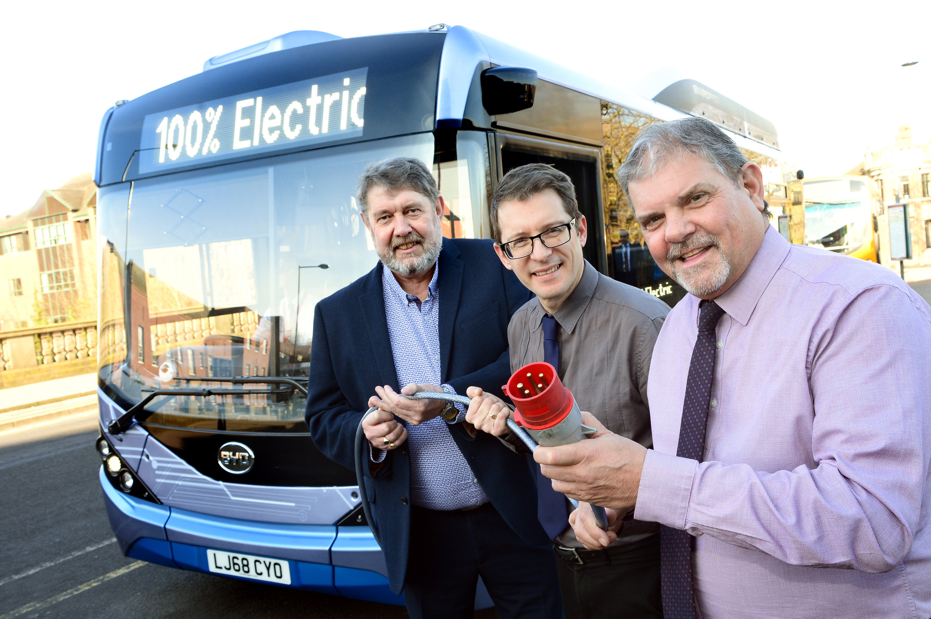 Derby City Council leader Chris Poulter and deputy leader Matthew Holmes with trentbarton’s Jeff Counsell. 